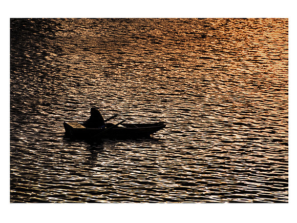 The lonesome boatman, Vltava river, Prague, Czech Republic